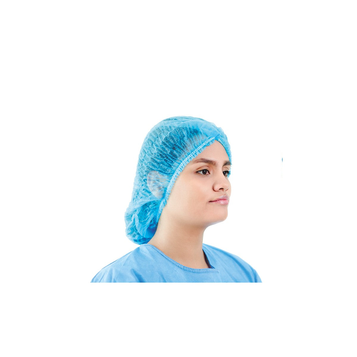 Gorro tipo oruga azul de polipropileno no estéril, con elástico autoajustable, diseñado para cubrir el cabello en procedimientos médicos.