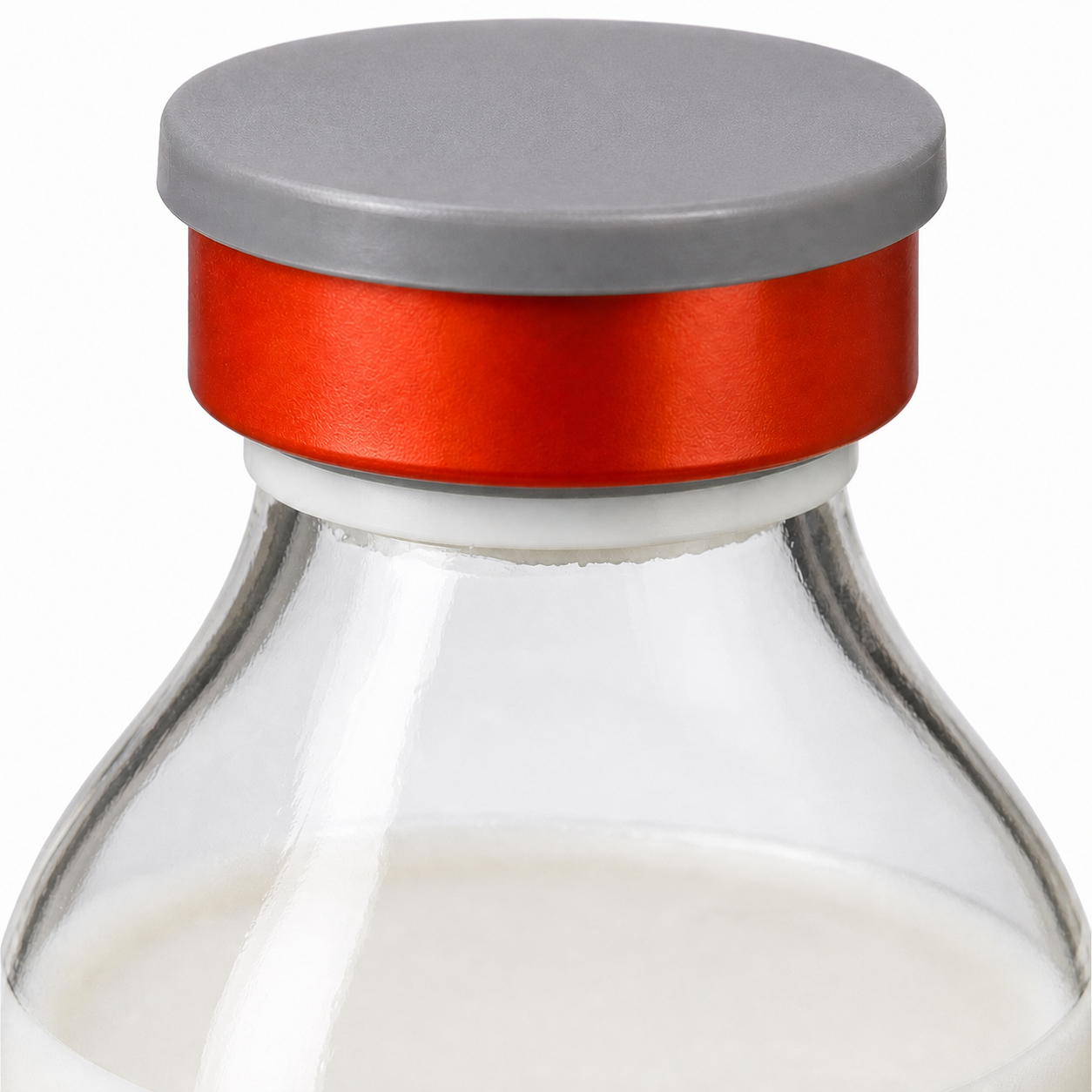 Detalle tapa gris de vial Lipofundin MCT LCT 20 de B Braun mostrando sistema de cierre y sellado