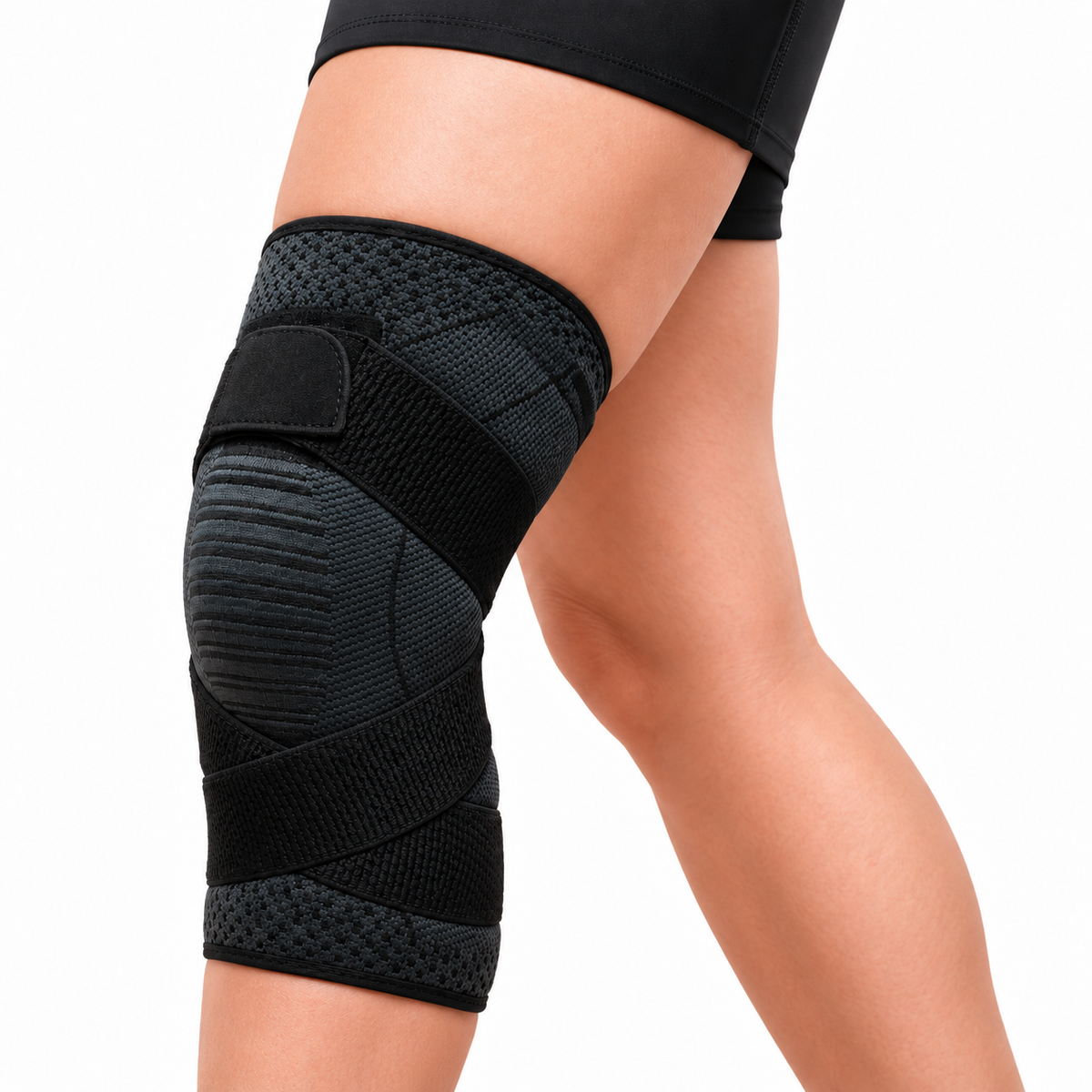 Rodillera deportiva cruzada GMD talla L, referencia GMD-928-L, diseñada para brindar soporte, compresión y estabilidad en la rodilla.
