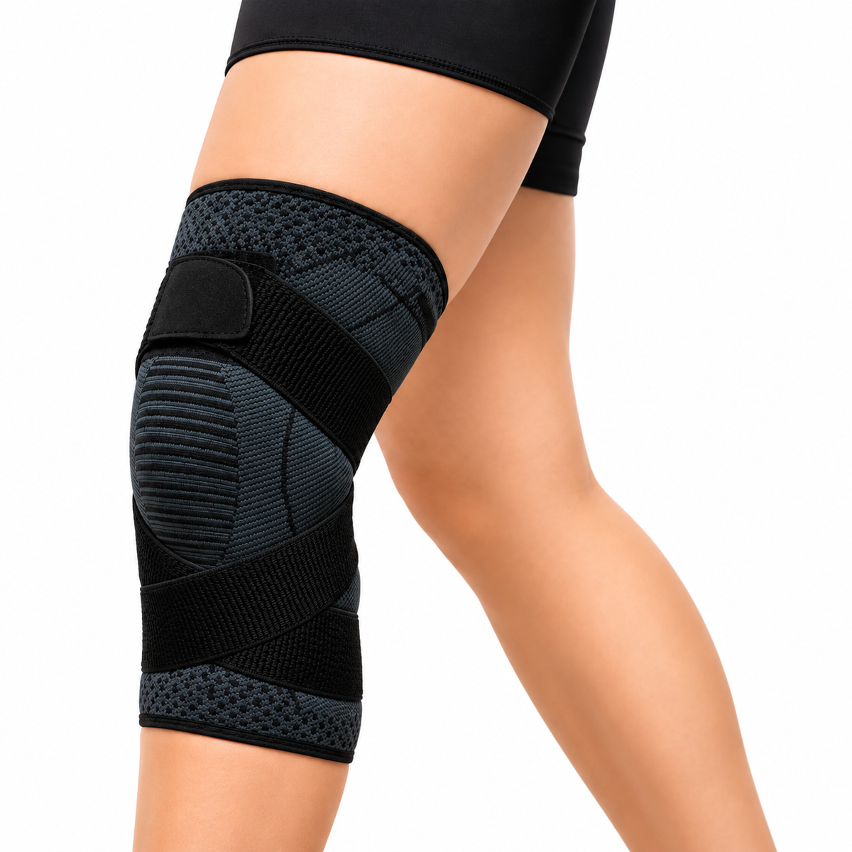 Rodillera deportiva cruzada GMD talla M, referencia GMD-928-M, diseñada para brindar soporte, compresión y estabilidad en la rodilla.