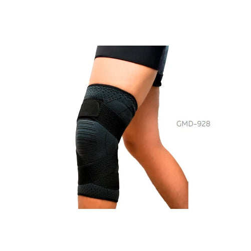Rodillera deportiva cruzada GMD T/M, modelo GMD-928-M, fabricada en neopreno negro, diseñada para soporte y estabilidad en actividades deportivas.