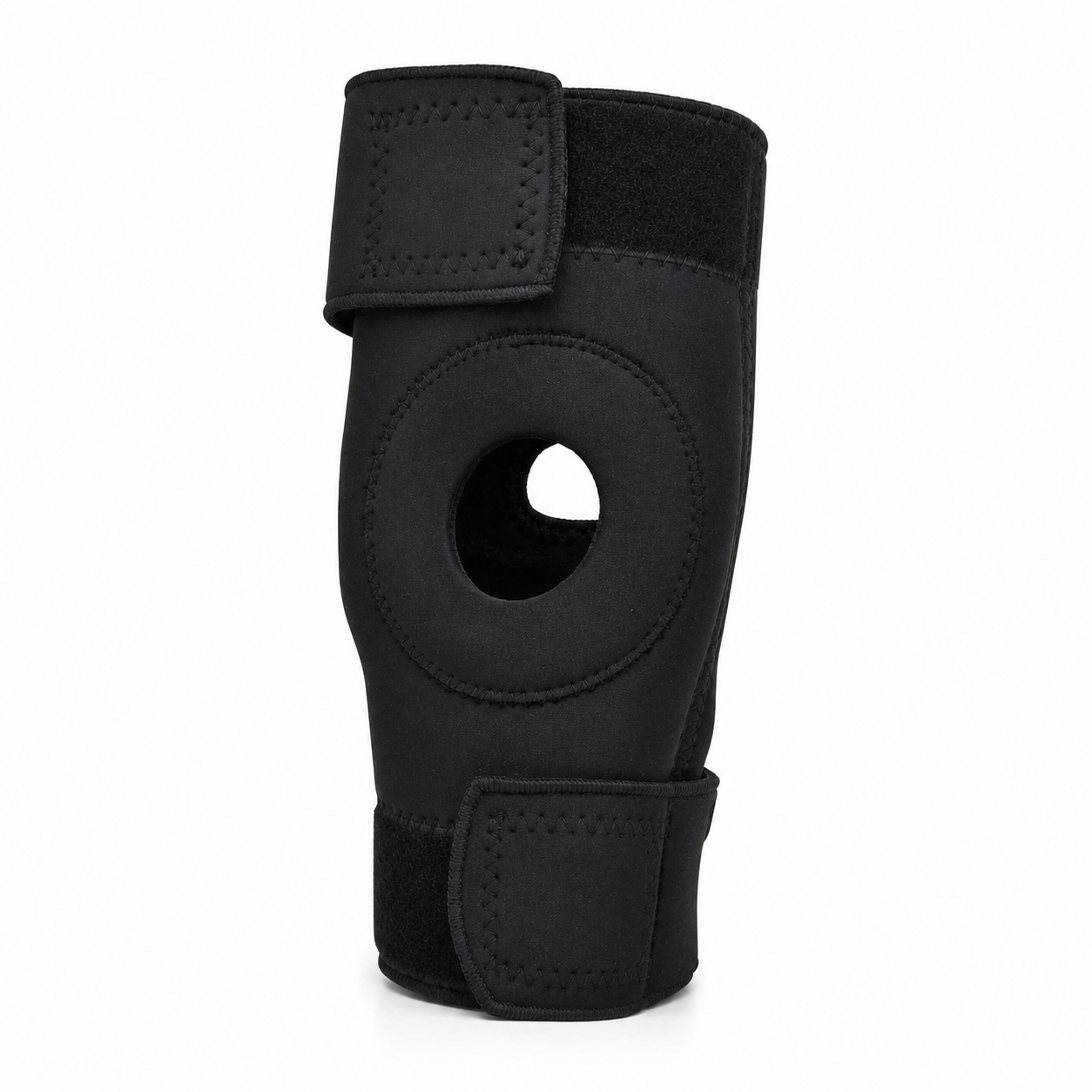Rodillera de neoprene negra abierta universal con diseño anatómico para soporte de rodilla.