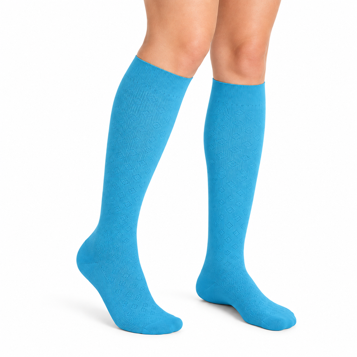 Calcetín de compresión para mujer Novarix 15-20 mmHg, talla L, con diseño de rombos en azul aguamarina.