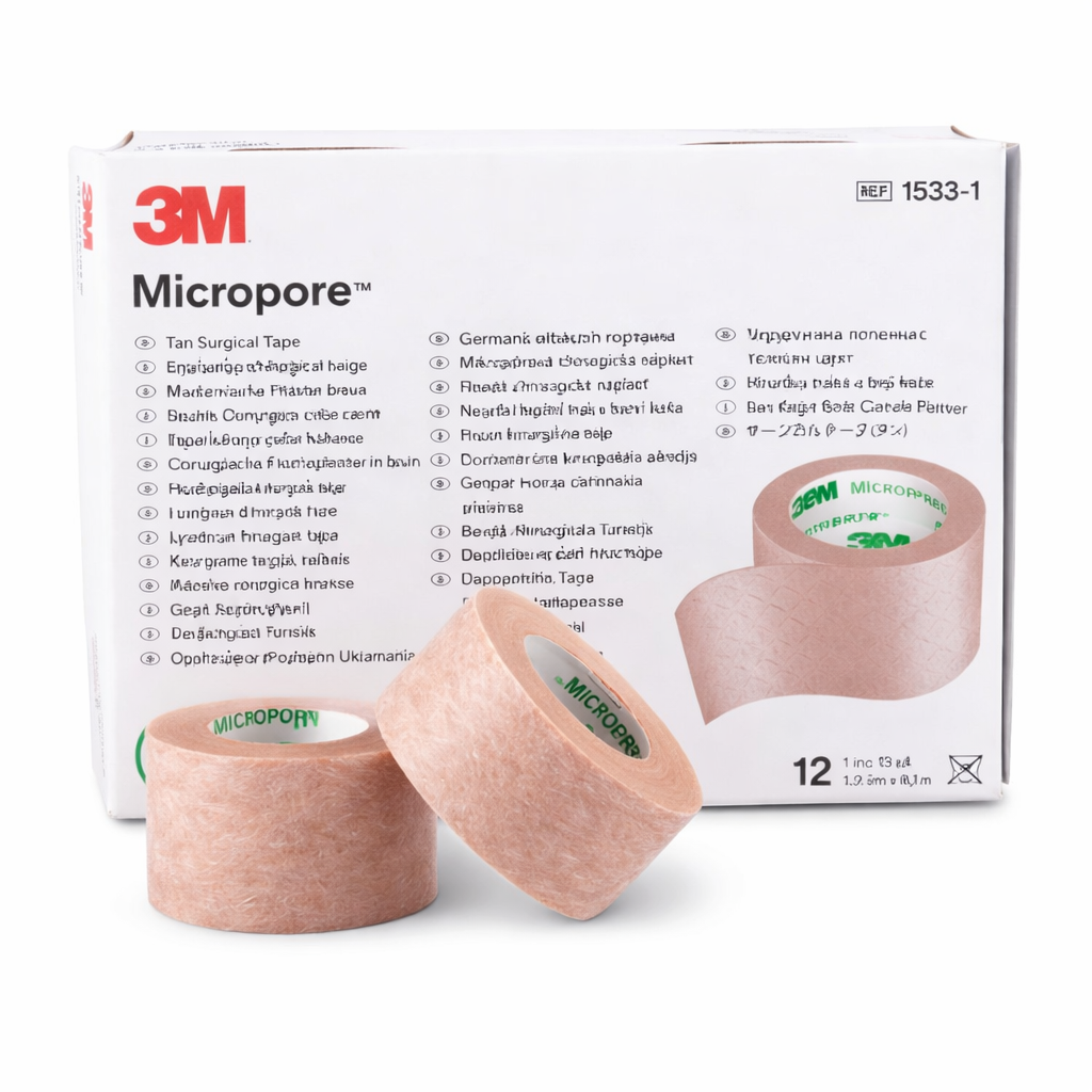 Cinta adhesiva MicroPore de 1" de ancho, color blanco, presentada en un empaque de 12 unidades, ideal para uso clínico.