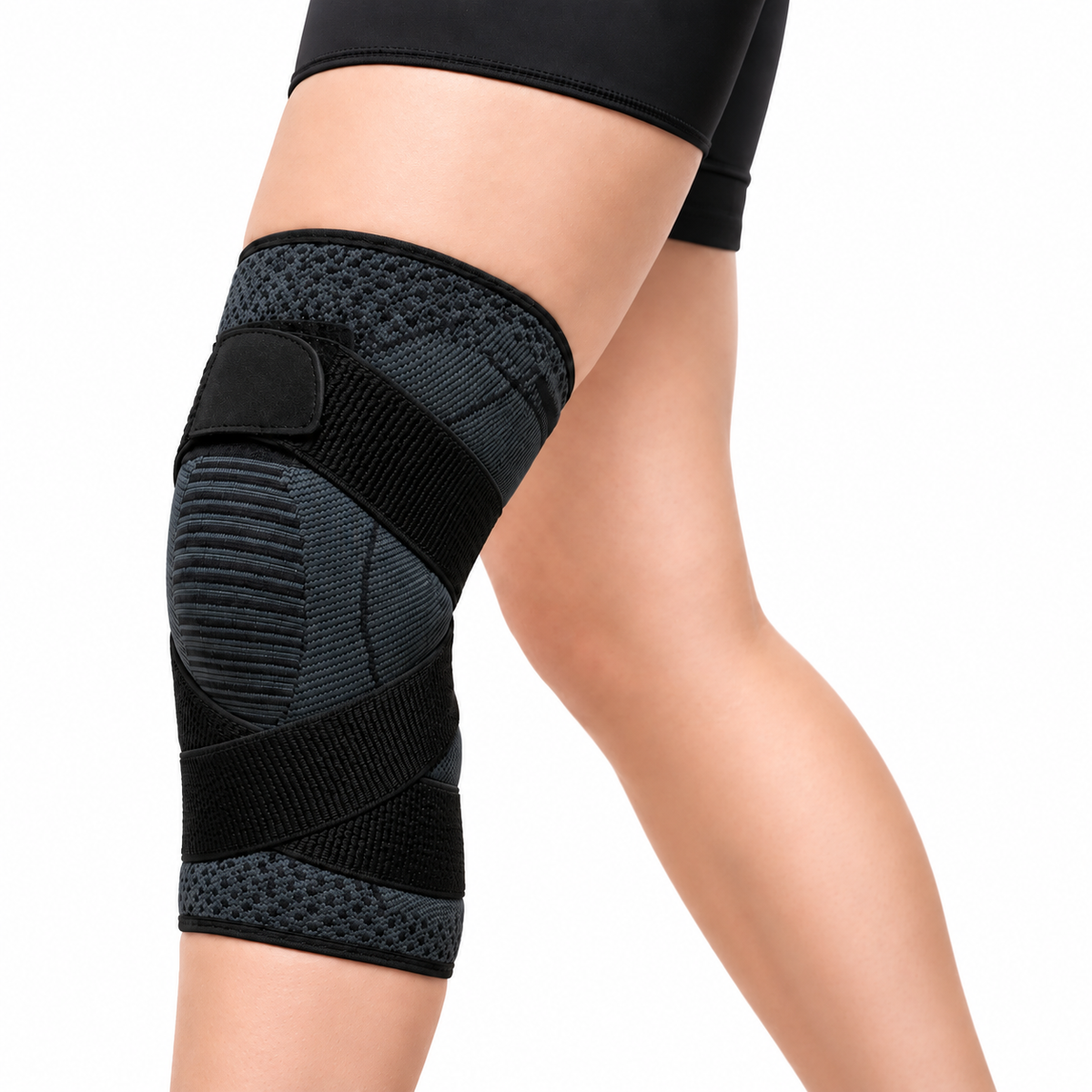 Rodillera deportiva cruzada GMD talla M, referencia GMD-928-M, diseñada para brindar soporte y estabilidad durante la actividad física.