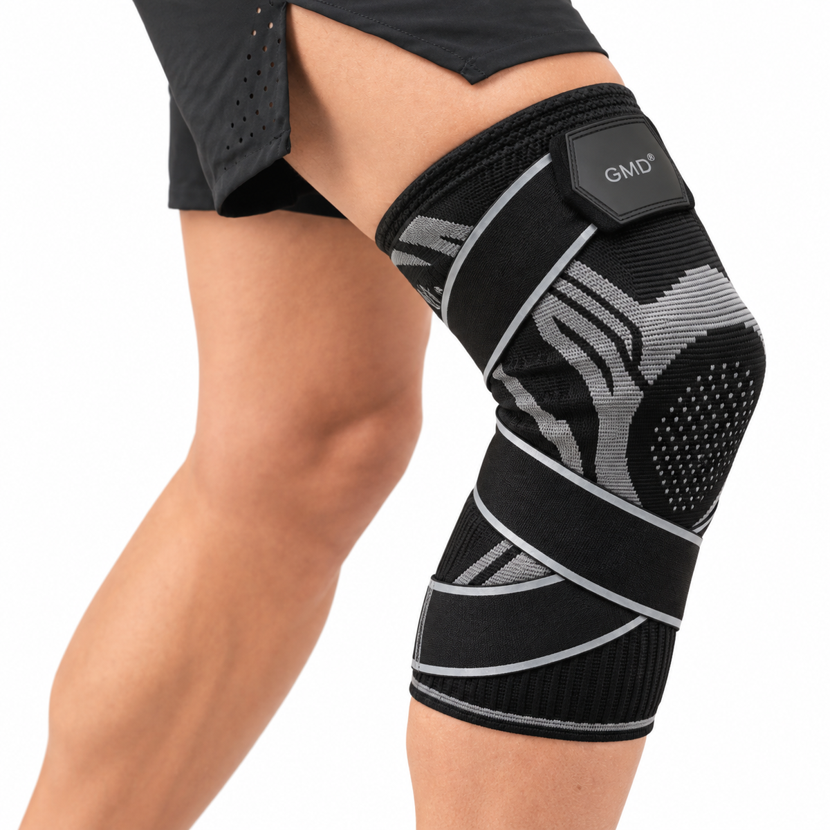 Rodillera deportiva estabilizadora GMD referencia GMD-868-L, diseñada para brindar soporte, compresión y estabilidad en la rodilla.
